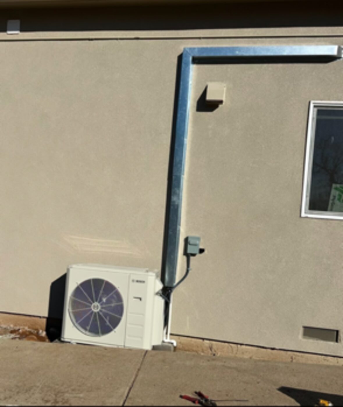 Ductless mini-split outdoor condenser with metal line hide in Shasta County